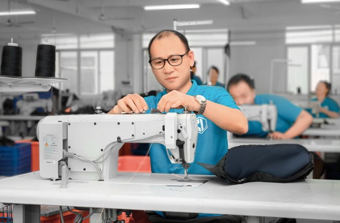 skilled workers saw the fabrics by machine