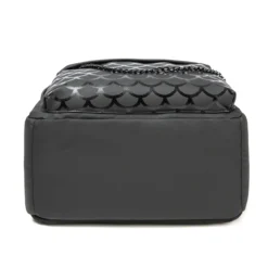 Bottom view of a black waterproof backpack featuring a glossy scale-pattern panel. Durable bag base by a Backpack Supplier.