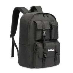 3D angled view of a black tactical backpack highlighting the 'BeUniq' rubber logo patch and the side zippered mesh pocket. Trendy daily commuter bag by a Custom Backpack Manufacturer.