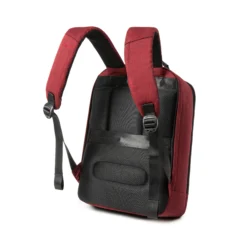 Side-back view of a minimalist burgundy business backpack with thick breathable mesh padding and padded shoulder straps. Custom commuter backpack by a professional Backpack Manufacturer.