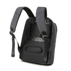 Side-back view of a minimalist dark grey business backpack with thick breathable mesh padding and padded shoulder straps. Custom commuter backpack by a professional Backpack Manufacturer.