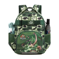 Green dinosaur backpack with a water bottle and umbrella in side mesh pockets. Functional kids' school pack by a Backpack OEM Supplier.
