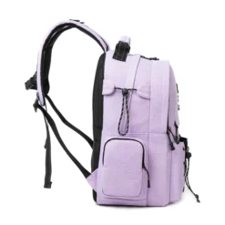 Side profile of a lilac and black backpack showing a side zippered pocket and slim profile. Spacious travel backpack by a Custom Backpack Supplier.