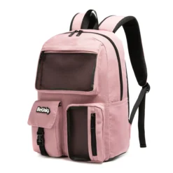 Slanted view of a dusty pink backpack featuring a large front mesh pocket, a buckled flap pocket, and black contrasting zippers. Functional school bag by a Backpack Supplier.