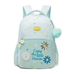 Front view of a mint green daisy backpack featuring a yellow logo patch, embroidered details, daisy zipper pulls, and a fluffy pom-pom charm. Complete school bag by a leading Backpack Supplier.