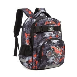 Side angled view of a camouflage backpack with a large red monster truck graphic and mesh side pocket. Trendy boys' school backpack by a Backpack Manufacturer.