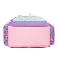 Bottom view of a pastel color-block kids' backpack showing a reinforced sturdy pink base. Durable school bag by a leading Backpack Supplier.