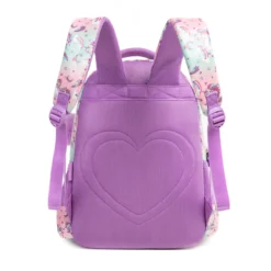 Full back view of a pastel unicorn backpack showing the large quilted heart, padded straps with matching patterns, and adjustable purple buckles. Cute school bag by a Backpack Supplier.