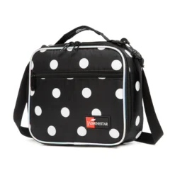 Slanted view of a black and white polka dot lunch bag with a front zipper pocket, a red logo patch, and reflective trim. Functional trendy cooler by a Backpack Supplier.