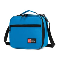Slanted view of a vibrant blue textured lunch bag with a front zipper pocket and a red logo patch. Functional commuter cooler by a Backpack Supplier.