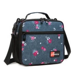 Slanted view of a denim blue floral print lunch bag with a front zipper pocket and a red logo patch. Custom casual cooler bag by a professional Backpack Manufacturer.