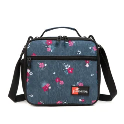 Front view of a denim blue floral insulated lunch bag with a large front pocket and dual zipper pulls. Versatile lunch box by a Custom Backpack Manufacturer.