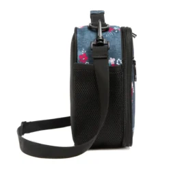 Side view of a denim blue floral lunch bag showing a large black mesh water bottle pocket and a sturdy strap swivel clip. Practical daily cooler by a Backpack Manufacturer.