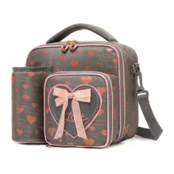 Slanted view of a dark gray glitter heart lunch bag with a matching detachable water bottle holder, heart-shaped zipper pulls, and a 3D bow patch. Functional luxury cooler by a Backpack Supplier.
