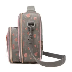 Side view of a dark gray glitter heart lunch bag showing the depth of the attached bottle holder and adjustable strap attachment. Functional luxury cooler by a Backpack Manufacturer.