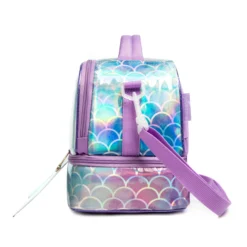 Side view of a pastel purple mermaid lunch bag showing the deep bottom compartment, white strap swivel clip, and iridescent scale pattern. Functional luxury cooler by a Backpack Manufacturer.