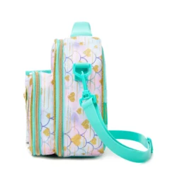 Side profile of a pastel mermaid-scale lunch bag showing its depth, adjustable mint green shoulder strap, and continuous glitter print. High-density fabric bag by a Backpack OEM Supplier.