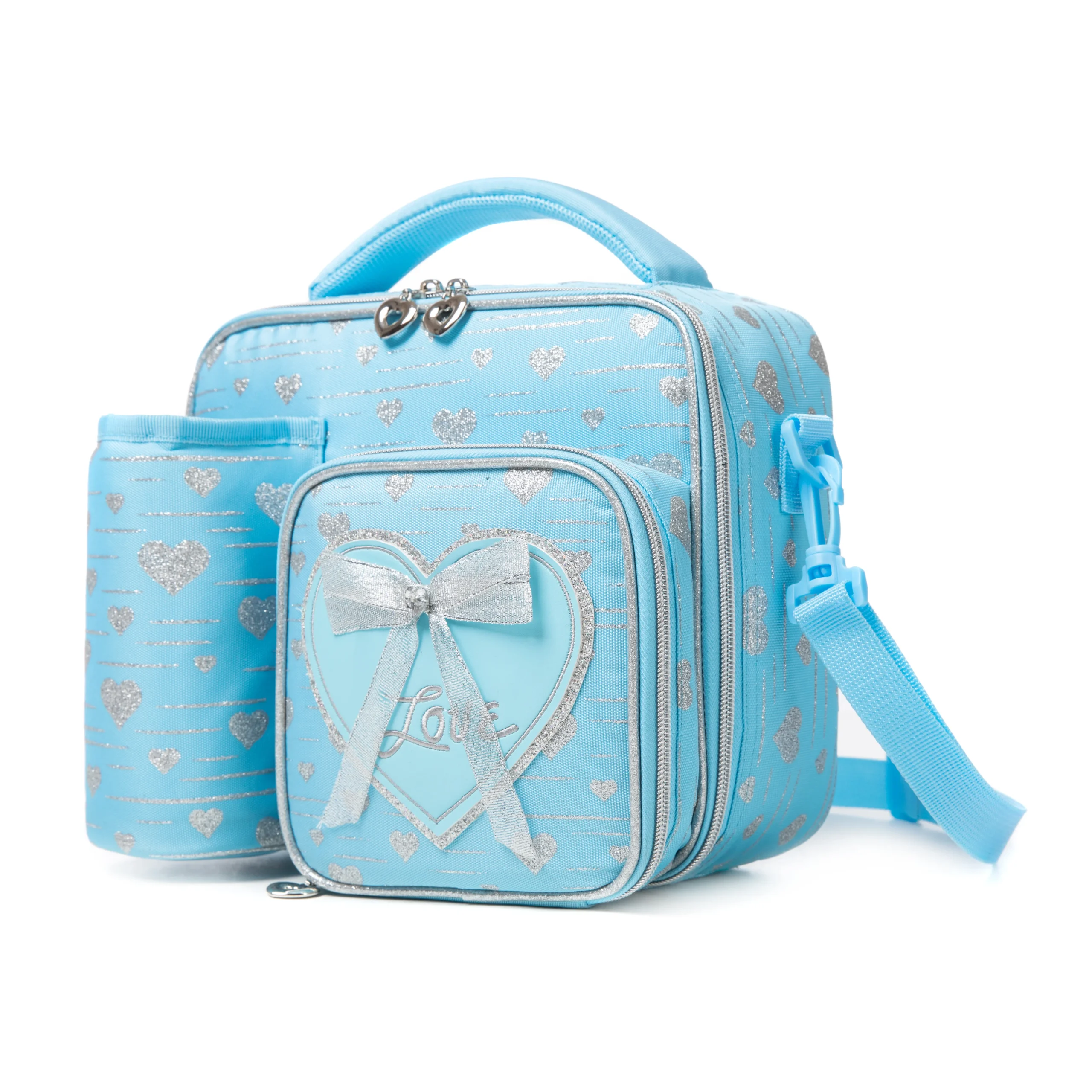Slanted view of a sky blue glitter heart lunch bag with a matching detachable water bottle holder, heart-shaped zipper pulls, and a 3D bow patch. Functional luxury cooler by a Backpack Supplier.