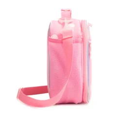 Side view of a pastel pink polka dot lunch bag showing a large pink mesh water bottle pocket, a translucent pink strap swivel clip, and iridescent piping. Functional daily cooler by a Backpack Manufacturer.