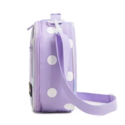 Side profile of a pastel lavender polka dot lunch bag showing its depth, adjustable purple shoulder strap, and iridescent border. High-density fabric bag by a Backpack OEM Supplier.