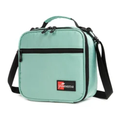 Slanted view of a mint green textured lunch bag with a front zipper pocket and a red logo patch. Functional commuter cooler by a Backpack Supplier.