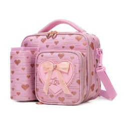 Slanted view of a pink glitter heart lunch bag with a matching detachable water bottle holder, heart-shaped zipper pulls, and a 3D bow patch. Functional luxury cooler by a Backpack Supplier.