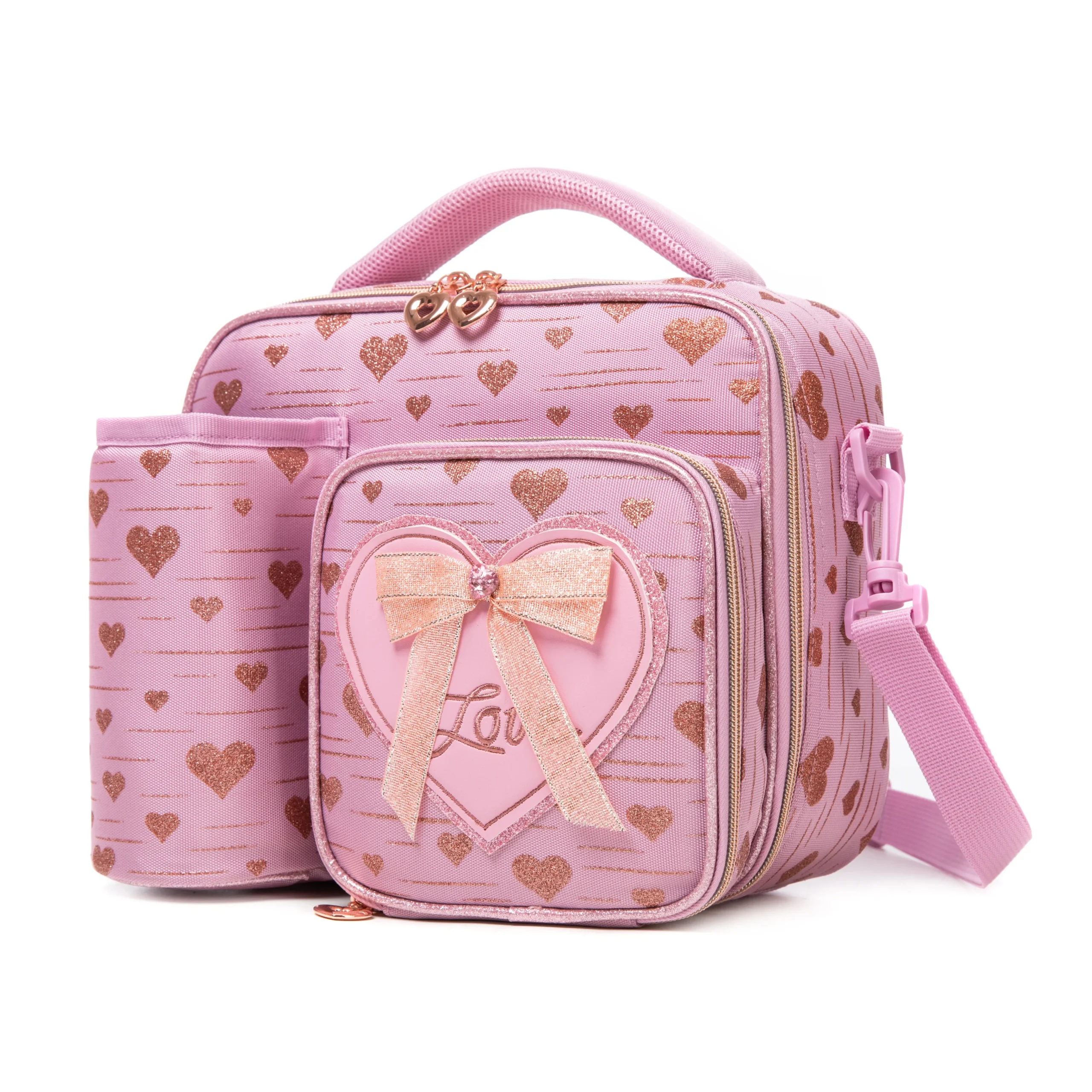 Slanted view of a pink glitter heart lunch bag with a matching detachable water bottle holder, heart-shaped zipper pulls, and a 3D bow patch. Functional luxury cooler by a Backpack Supplier.