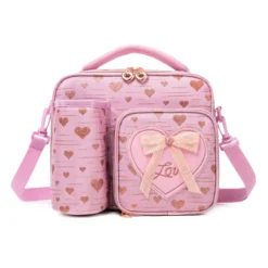 Front view of a pastel pink lunch bag with rose gold glitter hearts, a 3D bow patch, heart zippers, and an attached bottle holder. Versatile insulated lunch box by a Custom Backpack Manufacturer.