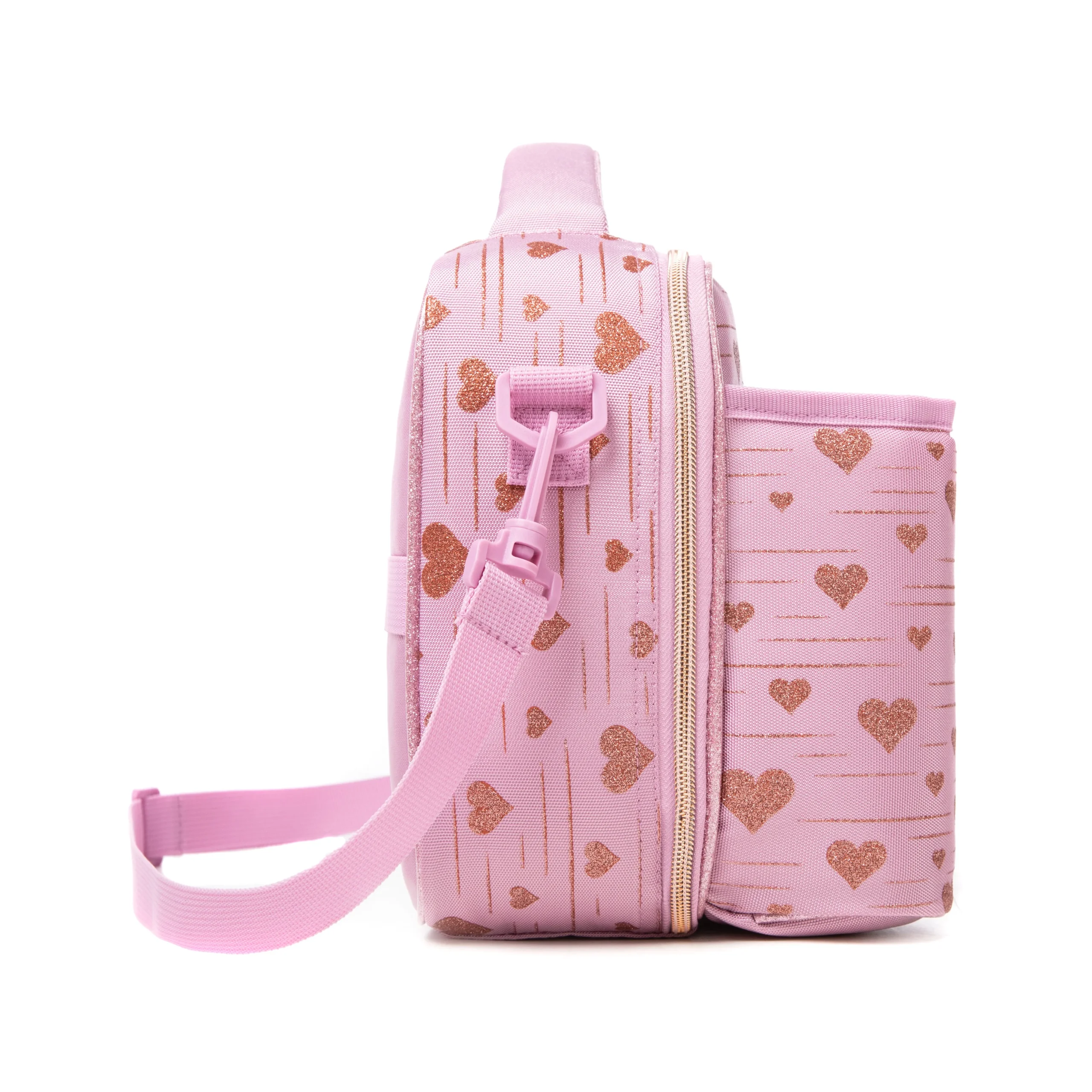 Side profile of a pastel pink glitter heart lunch bag showing its depth, adjustable shoulder strap, and continuous rose gold print. High-density fabric bag by a Backpack OEM Supplier.