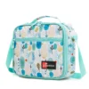 Slanted view of a mint green abstract print lunch bag with a front zipper pocket and red logo patch. Trendy school cooler by a Backpack Supplier.
