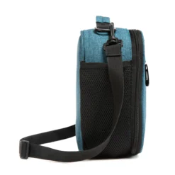 Side view of a deep teal lunch bag showing a large black mesh water bottle pocket and a sturdy strap swivel clip. Functional daily cooler by a Backpack Manufacturer.