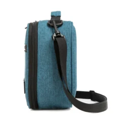 Side profile of a deep teal heather lunch bag showing its depth and adjustable black shoulder strap. High-density fabric bag by a Backpack OEM Supplier.