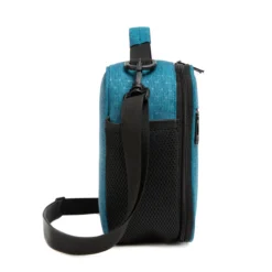 This angled shot showcases the lunch bag's premium black structural piping, which provides a strong contrast to the bright teal fabric, and the seamless transition from the front pocket to the main body. As a flexible OEM Supplier, we combine striking colors with premium structural integrity. This combination makes our Custom and Bulk Backpacks an excellent choice for Private Label brands catering to customers who appreciate high-quality, energetic minimalist design.