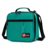 Slanted view of a teal emerald textured lunch bag with a front zipper pocket and a red logo patch. Functional commuter cooler by a Backpack Supplier.