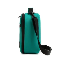 Side profile of a teal emerald lunch bag showing its depth and adjustable black shoulder strap. High-density fabric bag by a Backpack OEM Supplier.