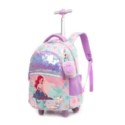 Slanted view of a cute mermaid rolling backpack featuring a shiny sequin front pocket, a 3D mermaid patch, and a purple pom-pom charm. Dreamy school trolley by a Backpack Manufacturer.